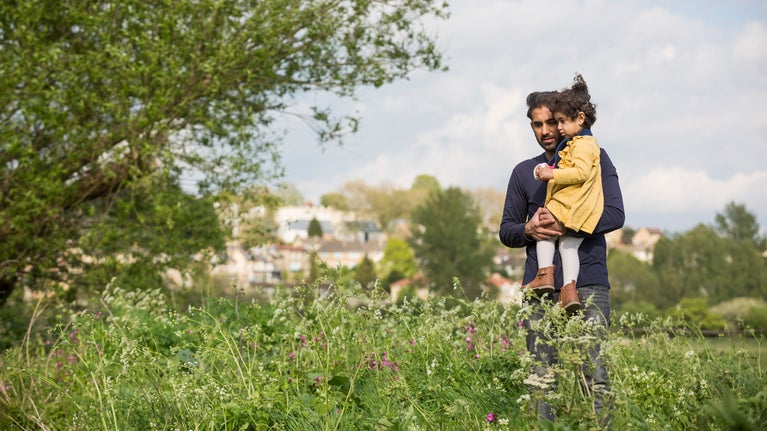 Visitors walking the 'green corridor' at Bathampton Meadows, Somerset